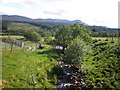 Track down to Dalchreichart Old Burial Ground beside Burn