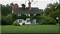 Large house at Tilford seen from byway