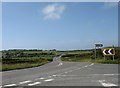 SH3186 : The A5025 north of the Black Lion junction by Eric Jones
