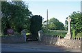 Guarlford War Memorial and the churchyard gates