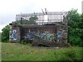 Fence around disused railway bridge