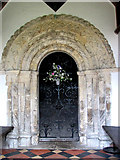 TM3699 : All Saints Church - Norman south doorway by Evelyn Simak