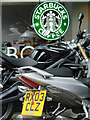 TQ3183 : Starbucks, Borders, Motorbikes by Stephen McKay