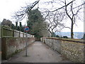 Flint wall and footpath