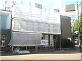 Scaffolding and plastic sheeting in Gosport High Street