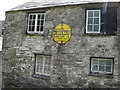 Old  Sign  on  Old  Building