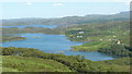 NC1632 : Looking down to the birch woods and Loch Ardbhair by Russel Wills