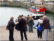 NU2232 : Queueing to board a tourist boat at Seahouses by Andy F