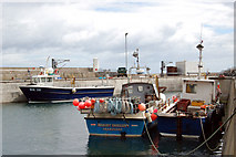 NU2232 : Fishing boats moored in the inner harbour at Seahouses by Andy F