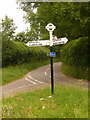 ST5800 : Sandhills: signpost at the Evershot turning by Chris Downer