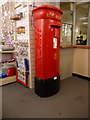 SZ1191 : Boscombe: postbox № BH1 399, inside the post office by Chris Downer