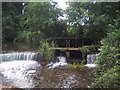 ST0542 : Weirs and sluice on the Washford River by Sarah Charlesworth