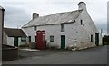 Traditional cottages and telephone box at Maenaddwyn