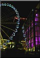 The Manchester wheel reflected in Harvey Nicholl