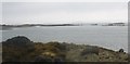 SH2987 : View across Porth Fudr towards the Carreg-y-fran reefs by Eric Jones