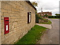 ST8216 : West Orchard: postbox № SP7 10 and noticeboard by Chris Downer