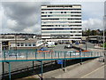 Office block by the station, from the footbridge