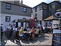 The Sloop Inn and public telephone kiosk