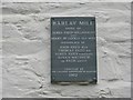 Commemorative plaque on Barlay Mill Lodge