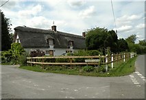 TL7348 : Thatched cottages in Hundon by Robert Edwards