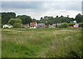 Low meadow towards houses by the Orwell