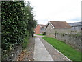 SO4981 : Path from All Saints, Culmington to the village street by Basher Eyre