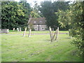 Slanting gravestones in the churchyard at Diddlebury