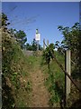 The footpath climbs toward the railway, Llanbadarn Fawr