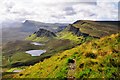 NG4468 : Trotternish and cemetery by Mike Green