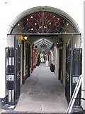 SJ3350 : Overton Arcade from Temple Row/Rhes y Deml - open by John S Turner