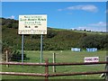 Signs at the entrance to Glan Morfa Mawr Caravan Park