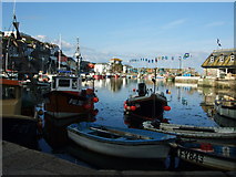 SX0144 : Fishing boats in inner harbour at Mevagissey by Richard Hoare