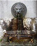 NO5791 : Lion's head fountain and drinking trough by Stanley Howe