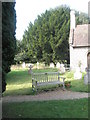 Seat in the churchyard at St Barnabas, Swanmore