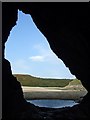 SS5387 : Pennard Pill & Burrows through Three Cliff Cave by Kev Griffin
