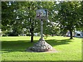 The village sign and green at Hauxton