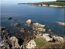 SX6146 : Rocks at the mouth of the Erme by Derek Harper