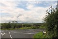 J5638 : The junction of Sheepland Road with the A2 at Ardtole by Eric Jones
