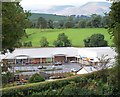 The Ballydugan Shopping Centre from the grounds of the Cathedral