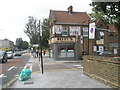 Approaching the junction of Tudor  Road  and The Broadway