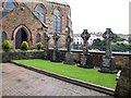 Ornate Celtic Crosses marking the graves of deceased parish priests at St Patrick