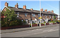 SJ8586 : Terrace of cottages on Wilmslow Road by Geoff Royle