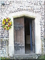 Harvest wreath outside St Mary, Buriton