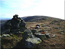 NX5084 : Summit cairn on Millfire by Gordon Brown