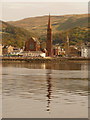 NS2059 : Largs: Clark Memorial Church reflected in the sea by Chris Downer