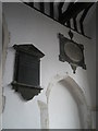 Memorials on the south wall at St John