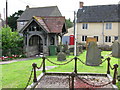 The lych gate and houses on The Street