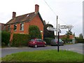 Road Junction and Signpost at Pleck