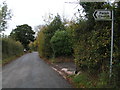 Road into Dunchideock and the sign to the Parish Church