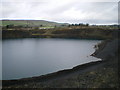 Pool in the bottom of Waterswallows Quarry